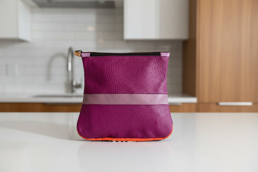 fucshia leather handbag side 1