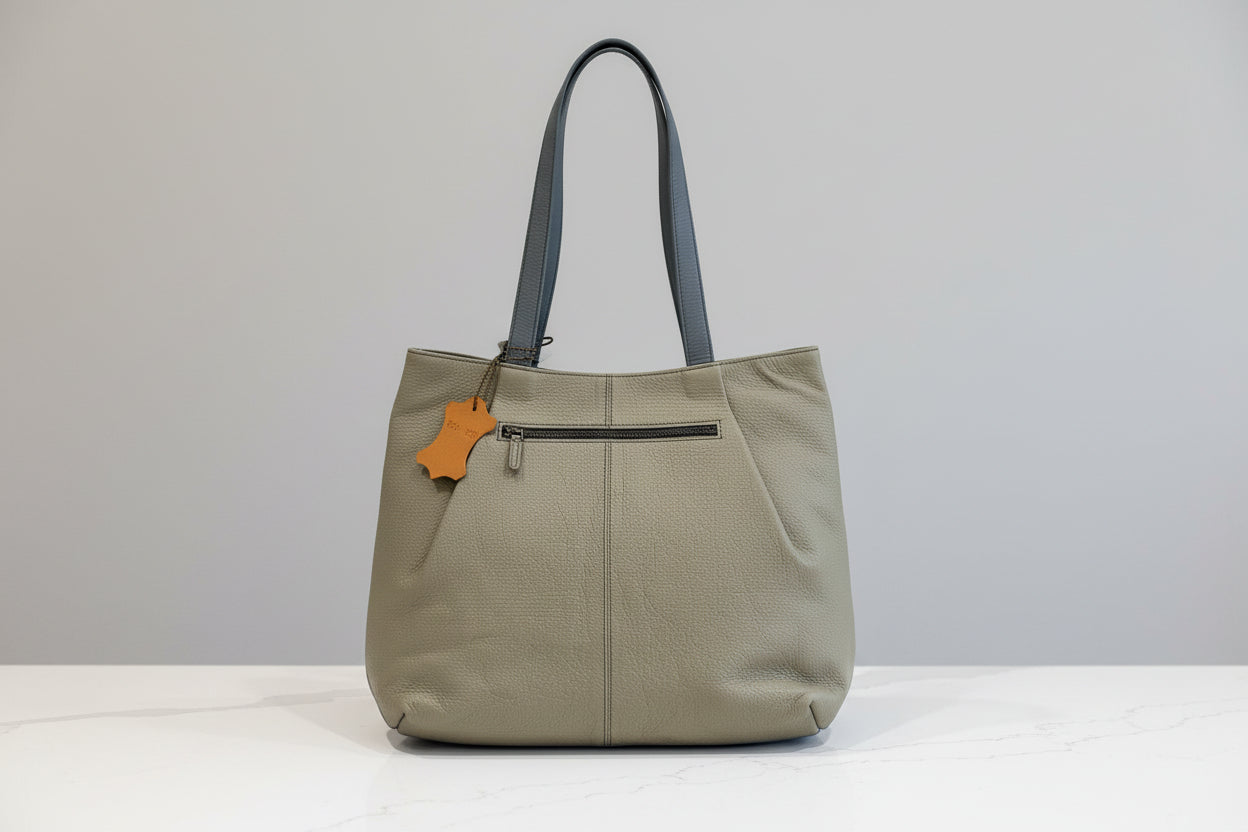 sage Green leather bag side 2 with zipper pocket