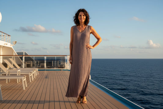Brown pleated dress on a white background