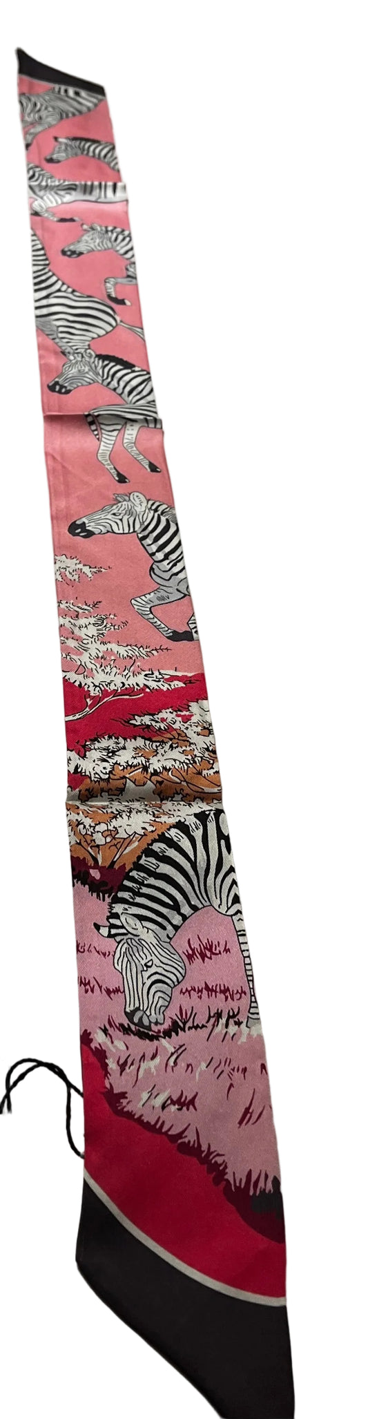 skinny tie scarf with zebra pattern on a marble surface