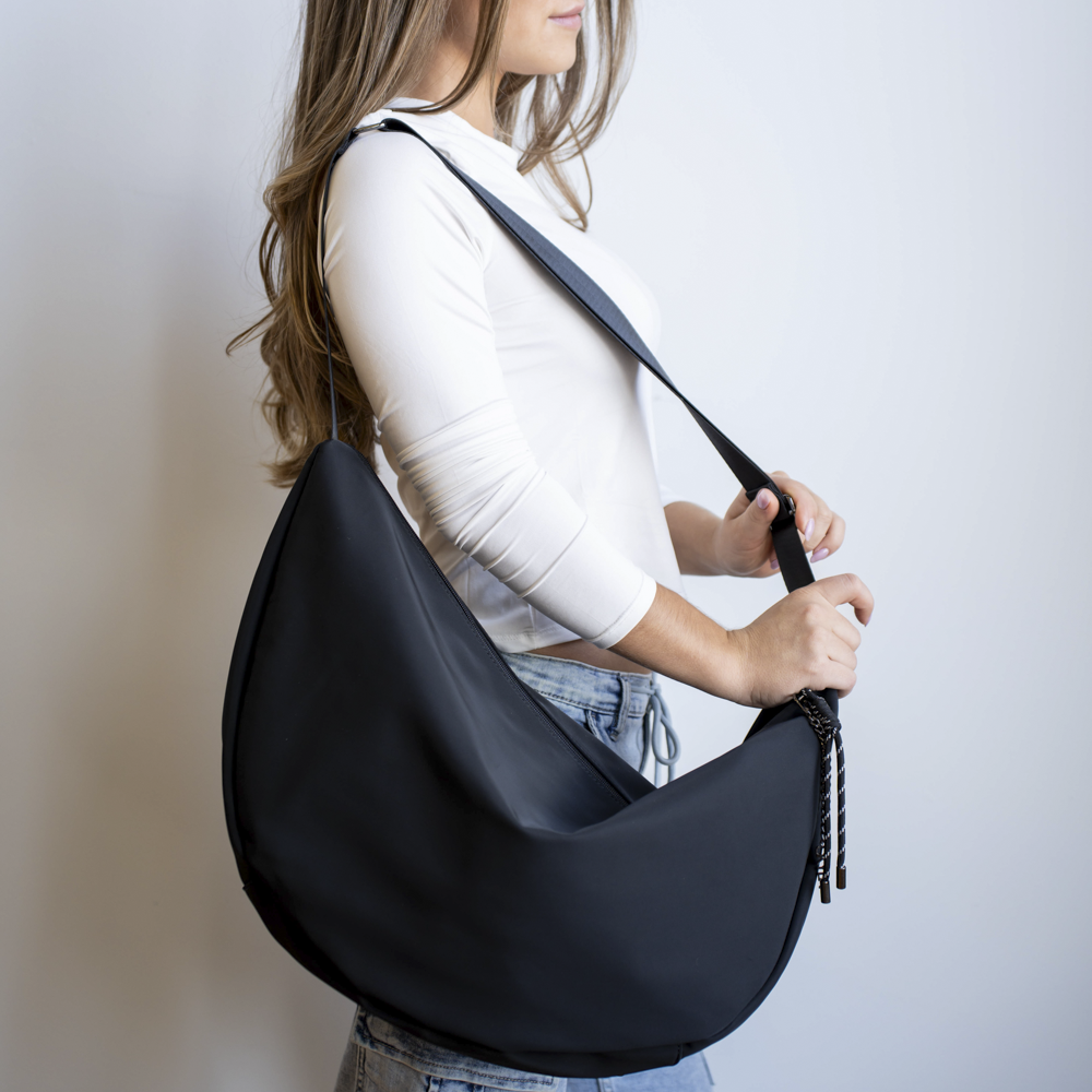 Chloe Oversized Nylon Crossbody Bag in Black, worn