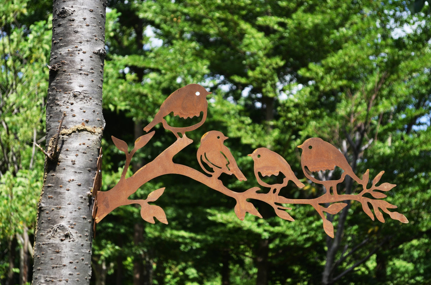 Marissa's Gifts - Family of rusty metal birds perched on a branch - Suttles & Seawinds