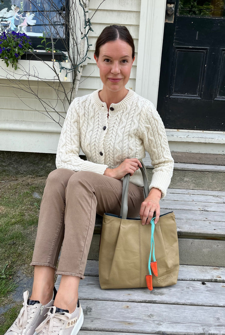 Cari dressed in IrelandsEye, FDJ, and Soruka at Suttles & Seawinds in Mahone Bay, Nova Scotia