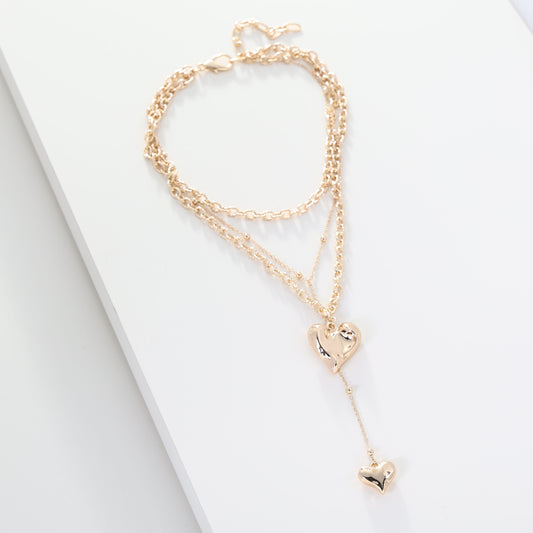 MULTI CHAIN WITH DOUBLE HEART DROP