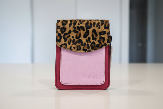 Pink handbag with leopard print flap 