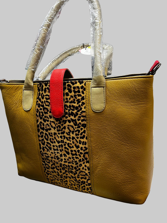 Brown leather bag with leopard print accent
