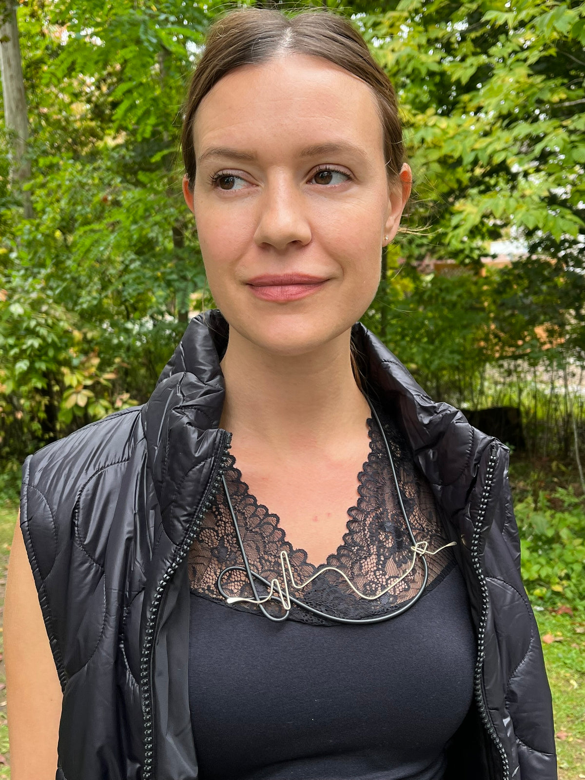 Cari in black for an event: Marie la Lune quilted long vest, Minus Vanessa top, Alembika mix skirt and Pursuits Cadence necklace
