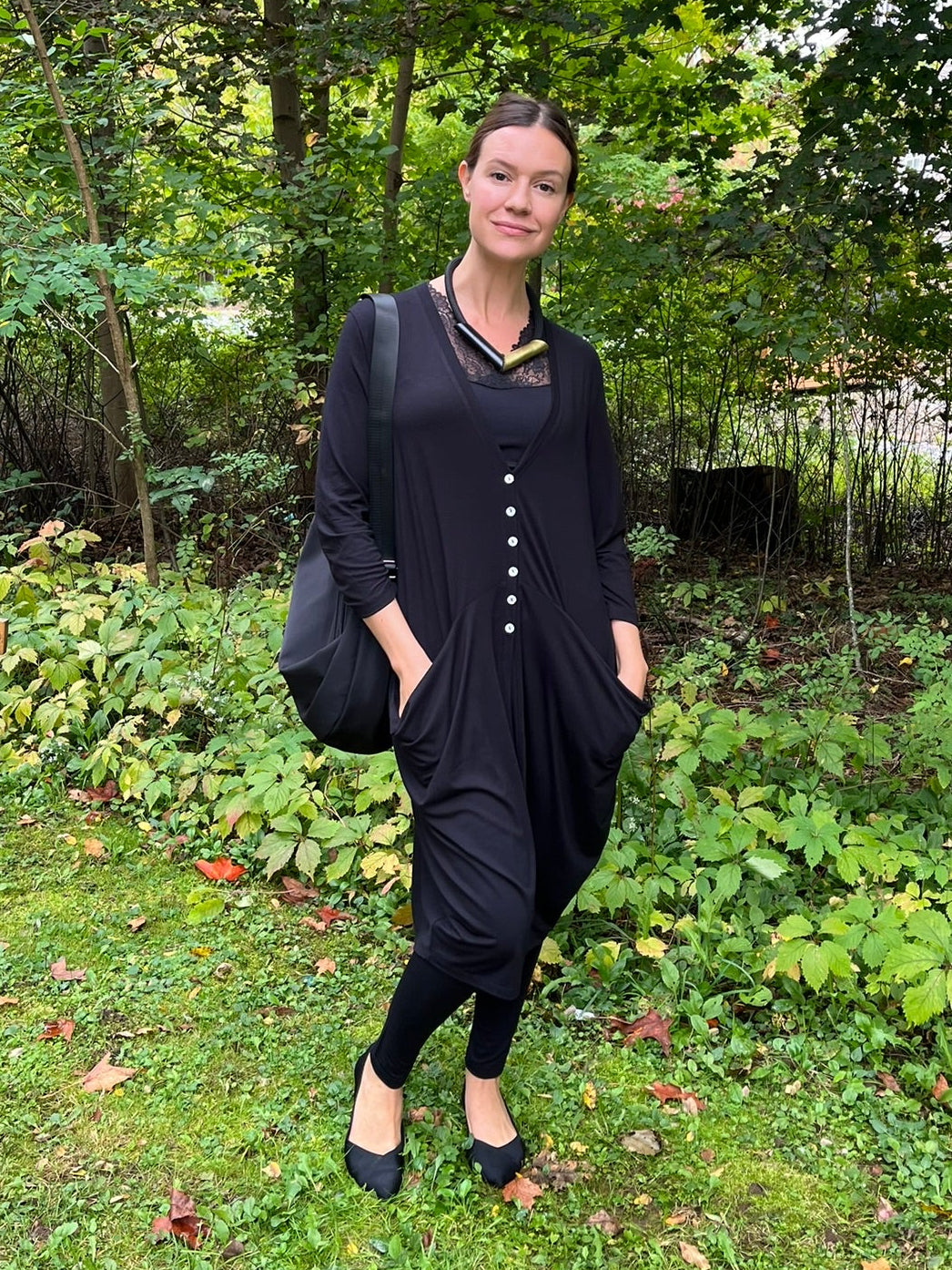 Cari in everyday black: Alembika cardigan, Minus Vanessa top, Blue Sky Ruby leggings, Skyla Chloe crossbody bag and Iskin Sisters necklace