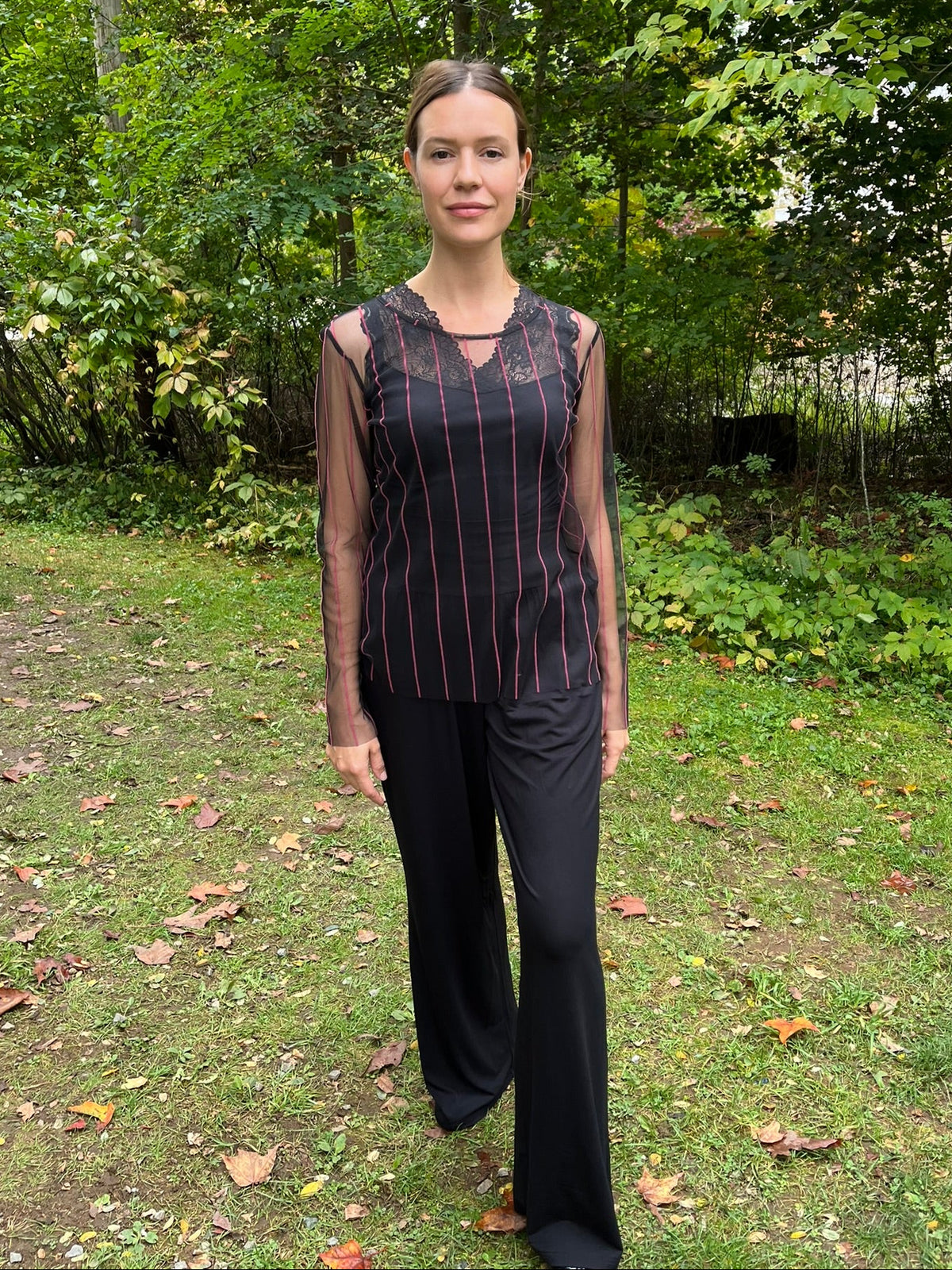 Cari in black for date night: Luukaa flocked stripe mesh top over a Minus Vanessa top with Blue Sky Gaylene pants