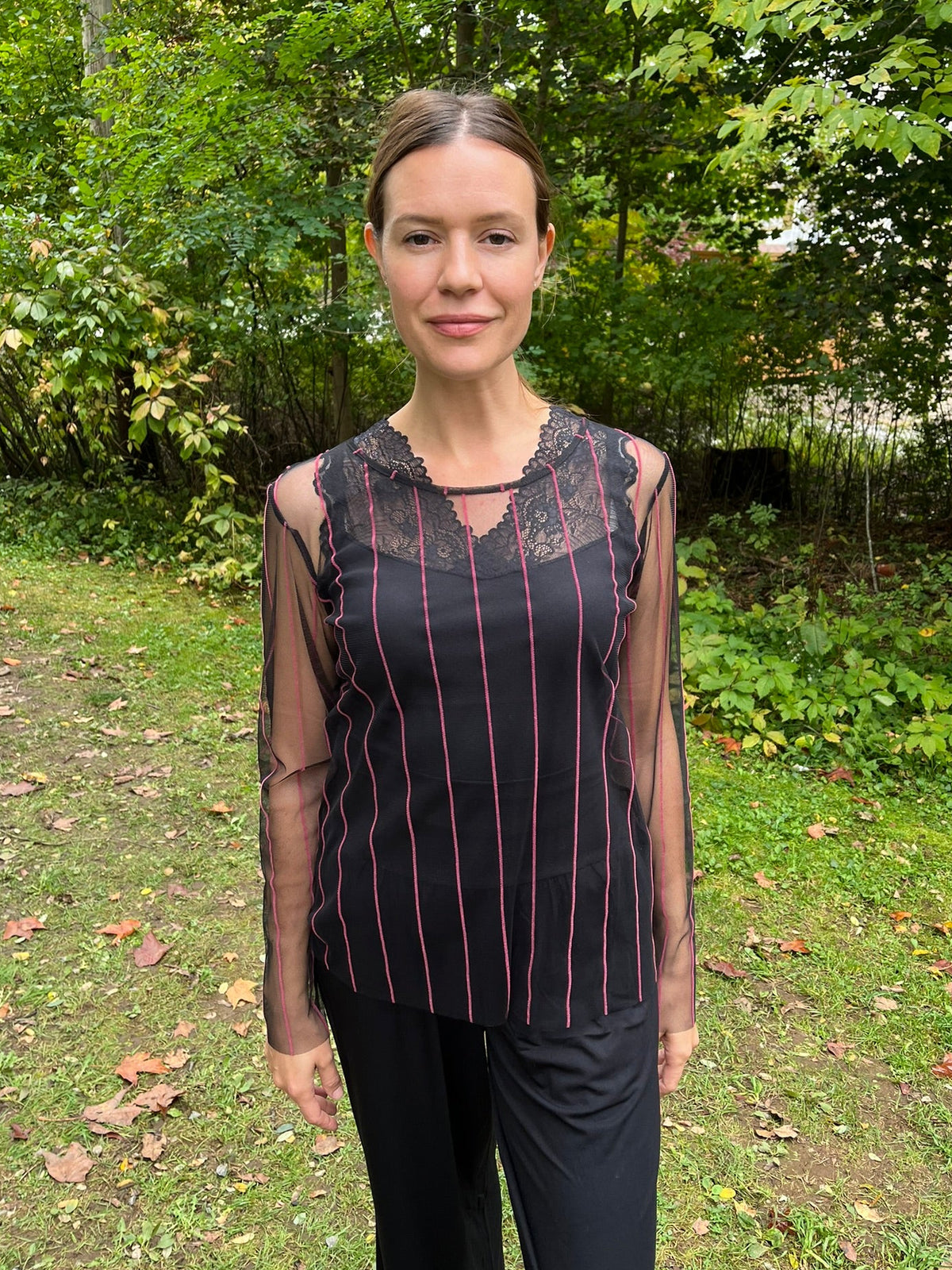 Cari in black for date night: Luukaa flocked stripe mesh top over a Minus Vanessa top with Blue Sky Gaylene pants
