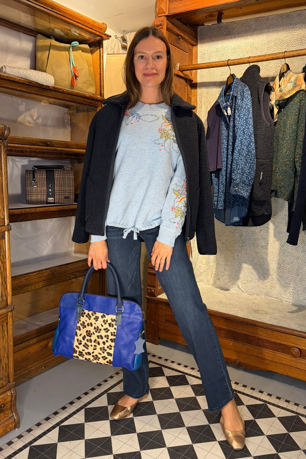 Cari wearing the White Stuff Embroidered Sweat with the Ilse Jacobsen Fleece Jacket, Wit & Wisdom Sawyer jeans and the Soruka Celine Tulip bag