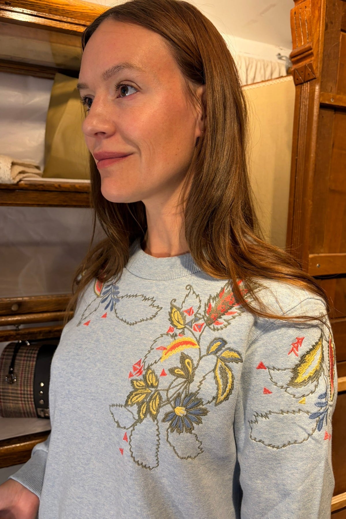Cari wearing the White Stuff Embroidered Sweat with the Ilse Jacobsen Fleece Jacket, Wit & Wisdom Sawyer jeans and the Soruka Celine Tulip bag