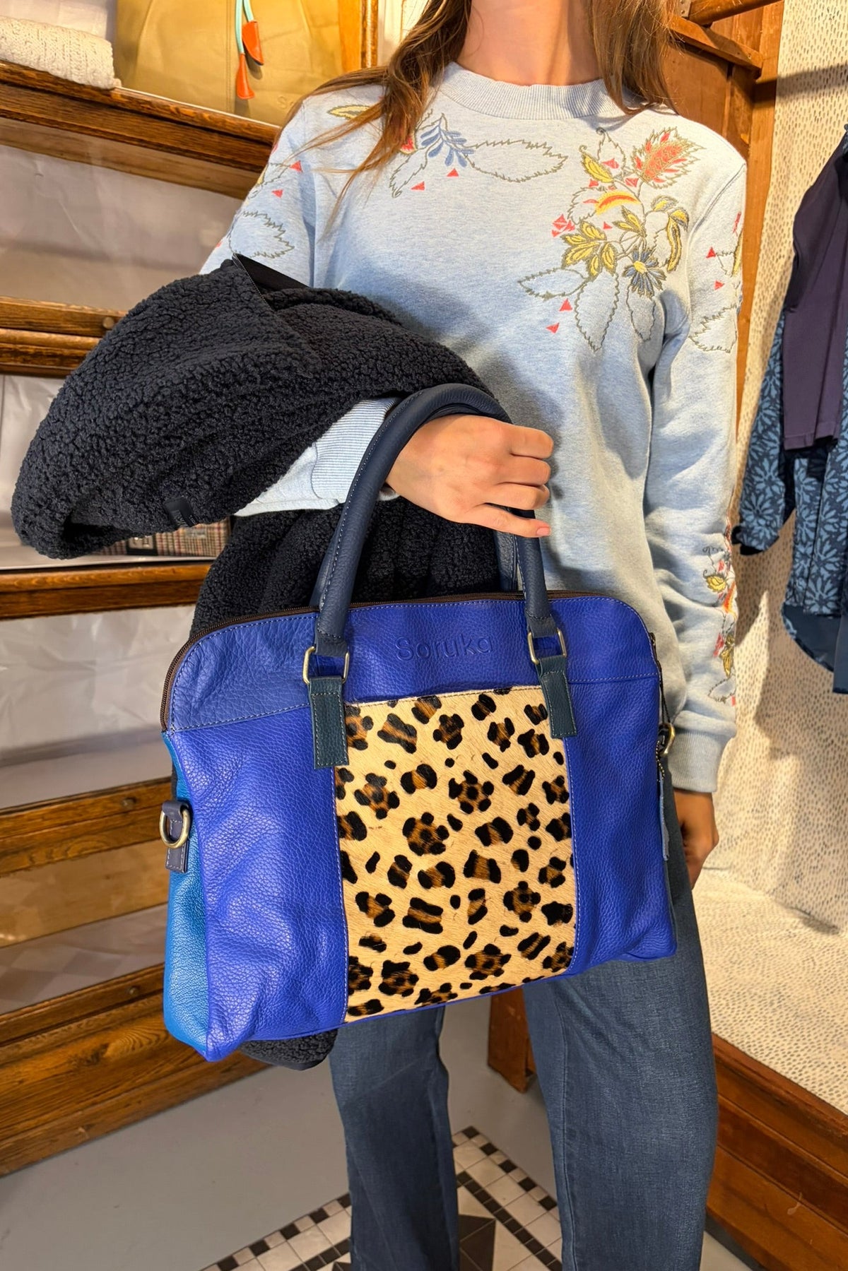 Cari wearing the White Stuff Embroidered Sweat with the Ilse Jacobsen Fleece Jacket, Wit & Wisdom Sawyer jeans and the Soruka Celine Tulip bag