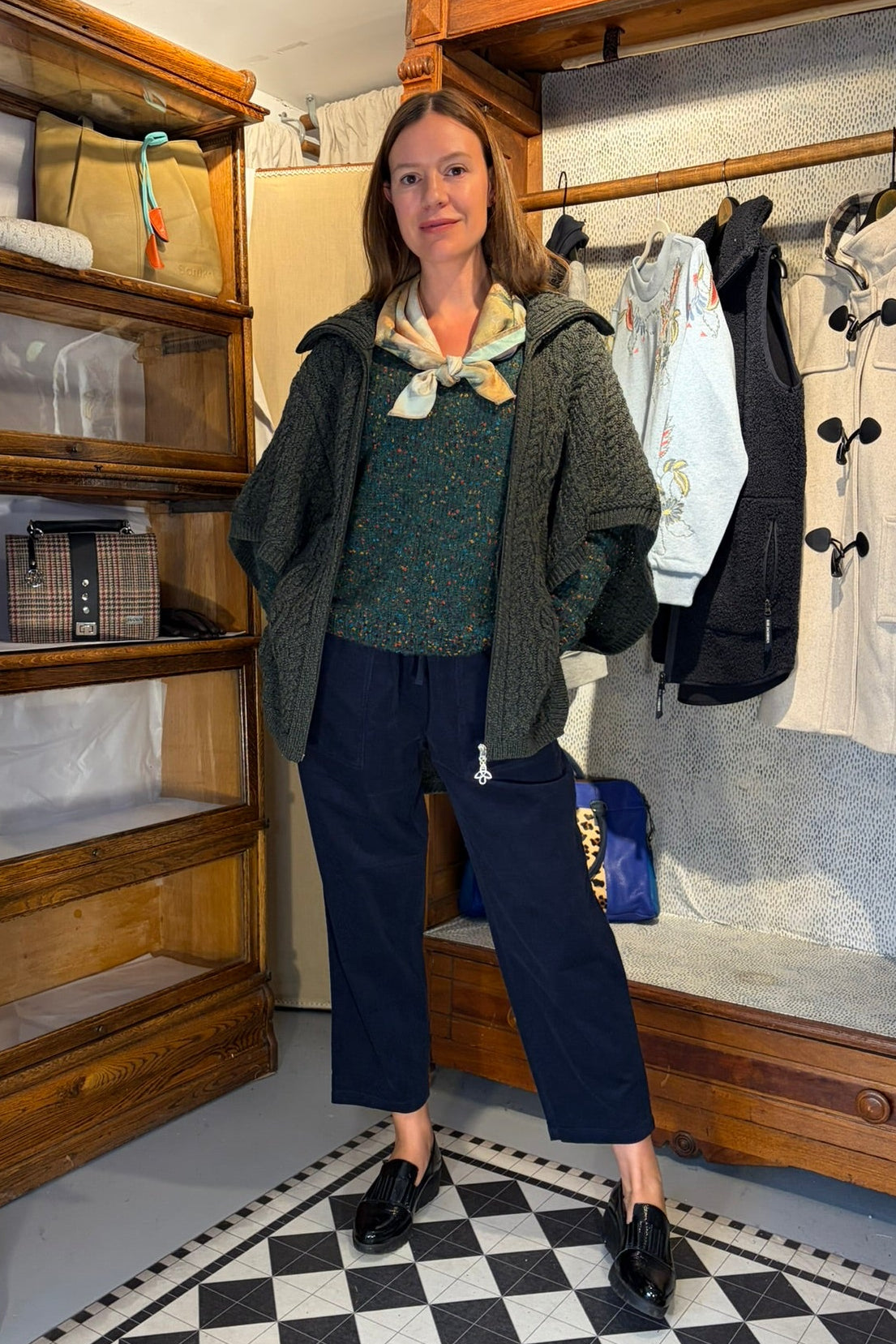 Cari wearing the Aran Crafts Innisfree funnel neck sweater over the White Stuff Texture V Neck Sweater with Seasalt Sholl cord trousers