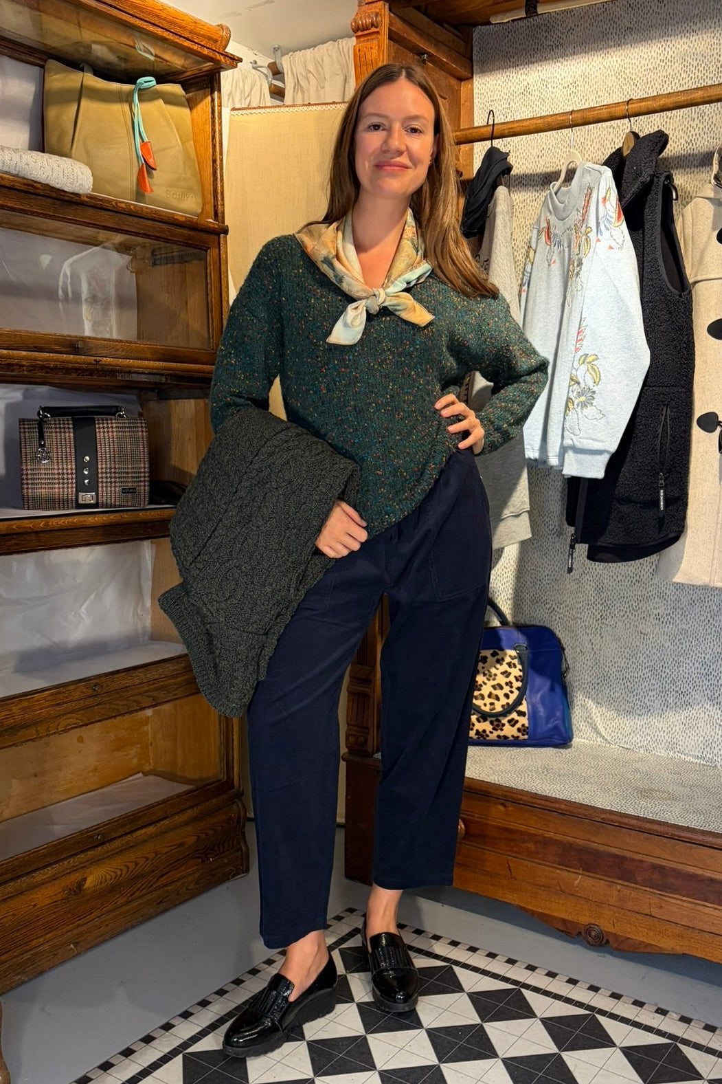 Cari wearing the Aran Crafts Innisfree funnel neck sweater over the White Stuff Texture V Neck Sweater with Seasalt Sholl cord trousers