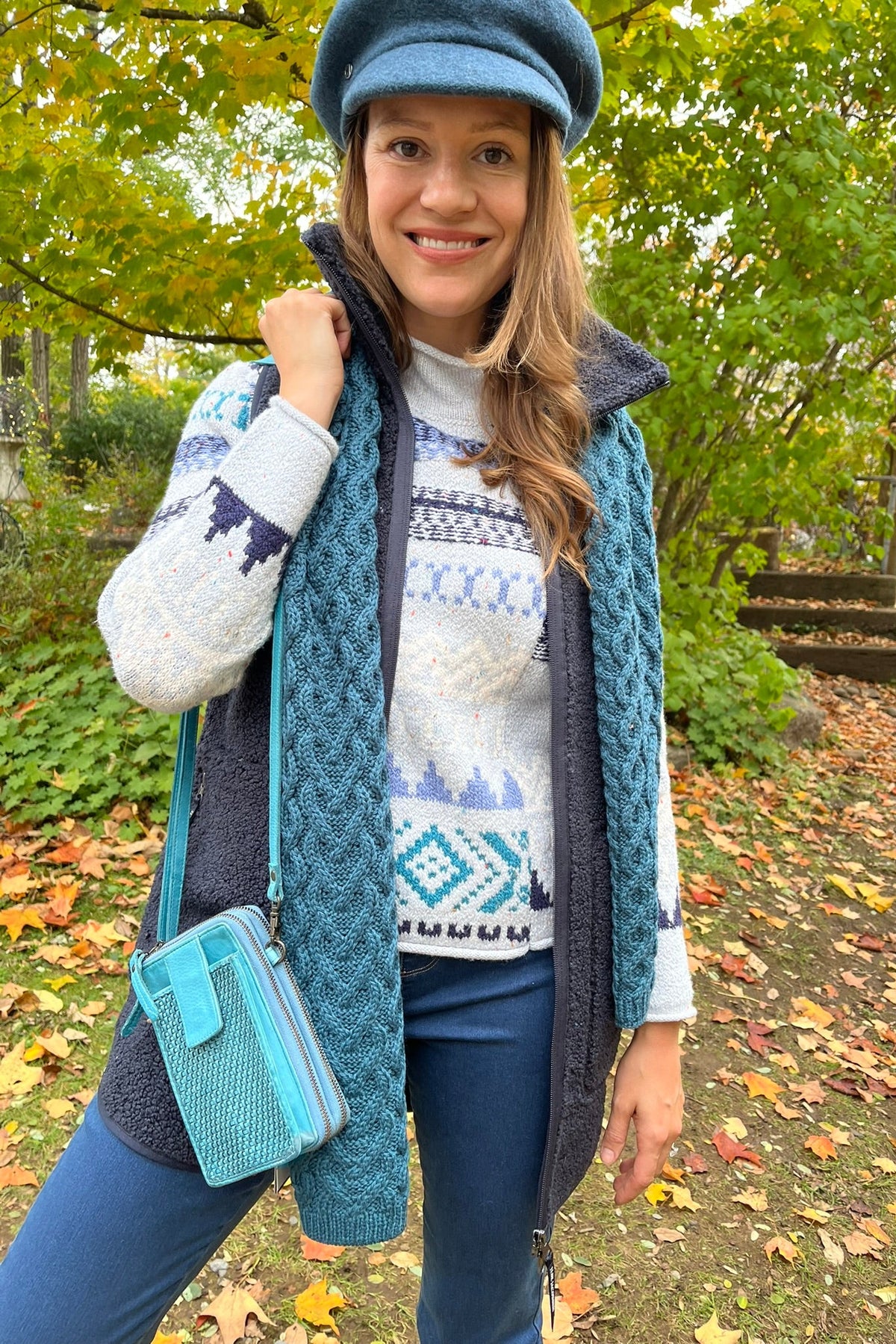 Cari wearing the Ilse Jacobsen long fleece vest over a Habitat Snowdrift sweater and FDJ jeans, with an Aran Crafts cable scarf and Milo crossbody bag