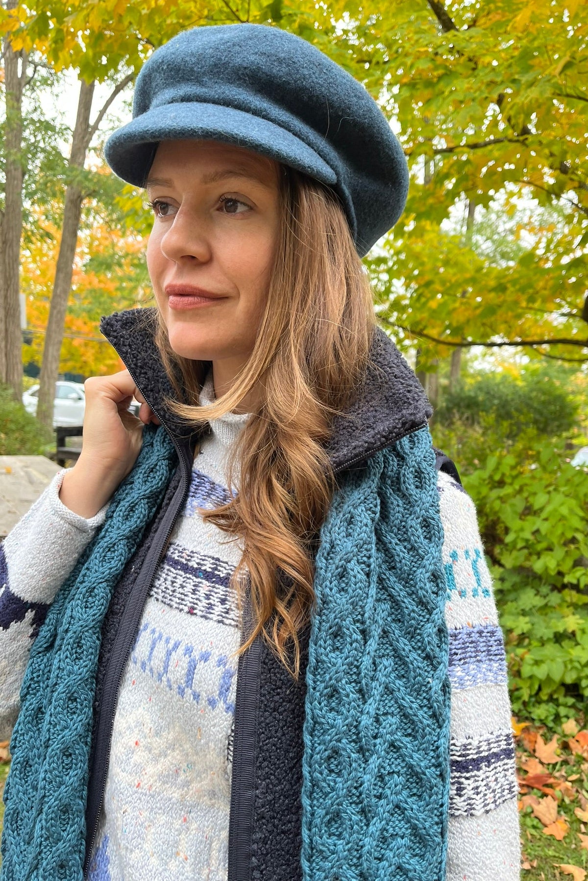 Cari wearing the Ilse Jacobsen long fleece vest over a Habitat Snowdrift sweater and FDJ jeans, with an Aran Crafts cable scarf and Milo crossbody bag