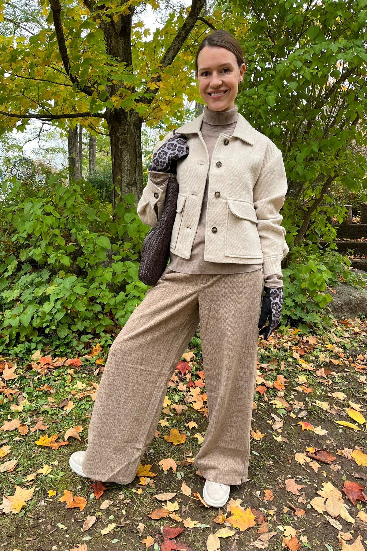 Cari wearing the Ilse Jacobsen short buttoned jacket in wheat, B. Copenhagen turtleneck and Wit & Wisdom Whitney trousers, with the Milo Albany bag and LUV & Co. leopard gloves
