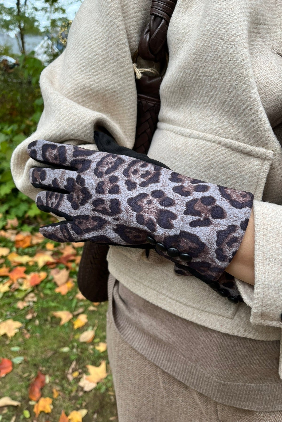 Cari wearing the Ilse Jacobsen short buttoned jacket in wheat, B. Copenhagen turtleneck and Wit & Wisdom Whitney trousers, with the Milo Albany bag and LUV & Co. leopard gloves