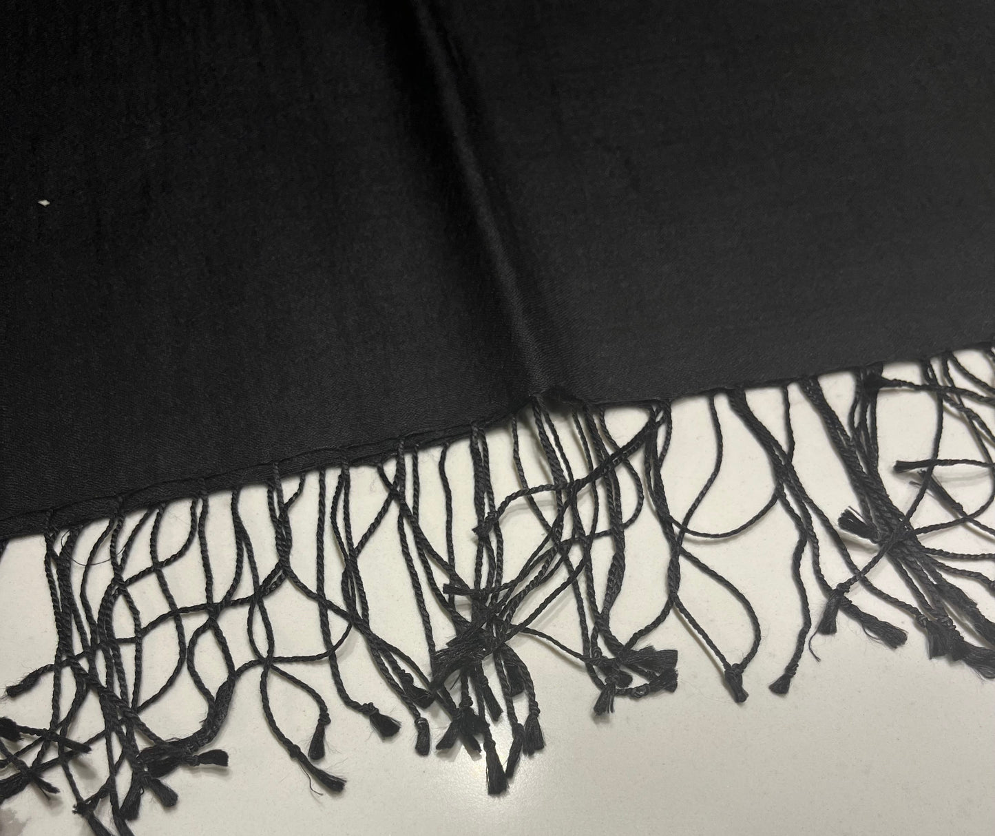 Black SCARF trim on a white background
