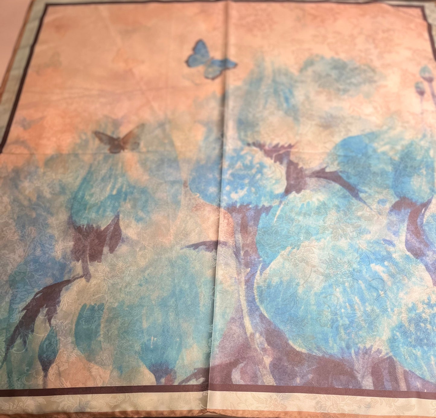 Decorative SCARF with floral and butterfly design on a textured surface