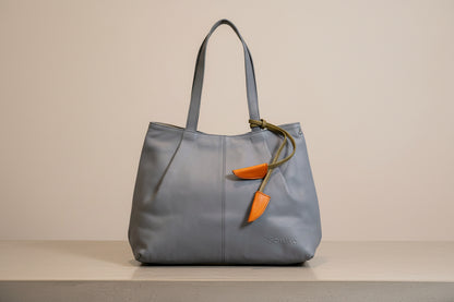 Gray handbag side 1
