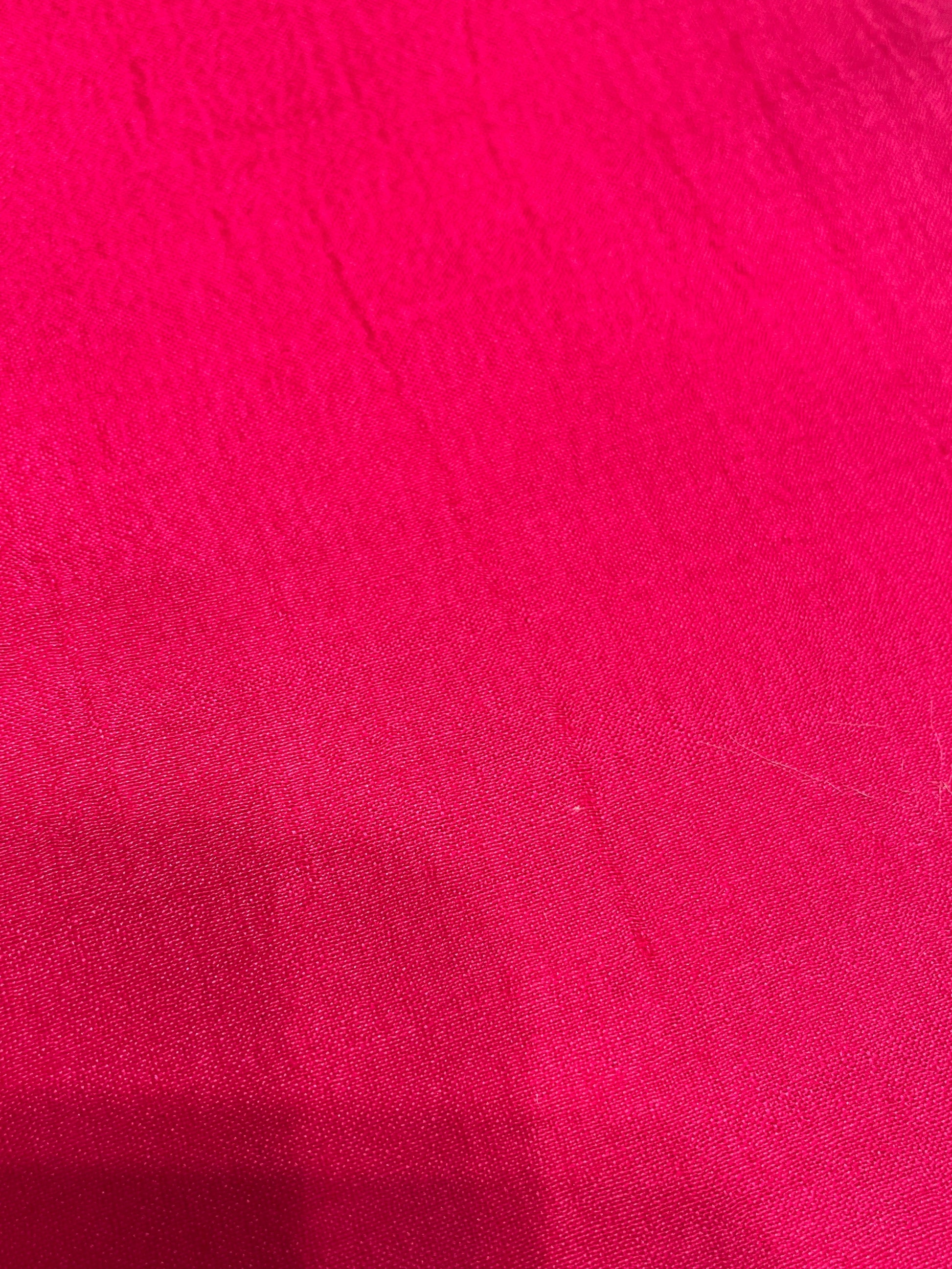 Close-up of a textured pink SCARF surface