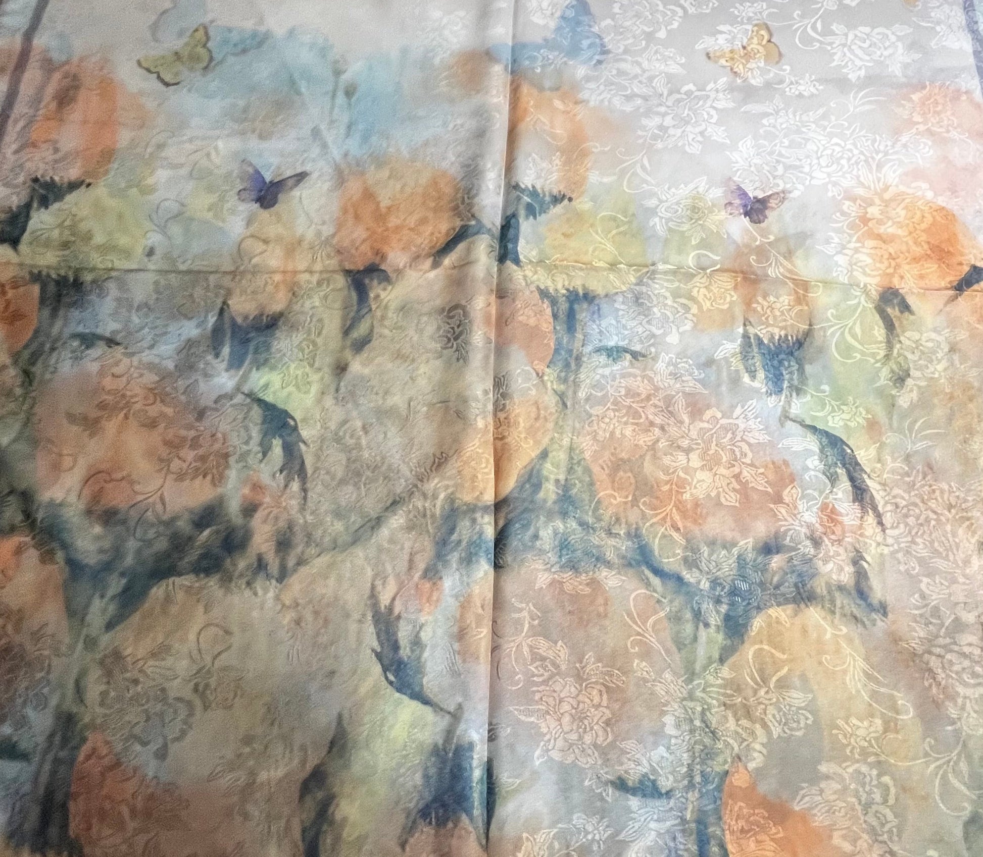 Floral patterned SCARF with butterflies on a white surface