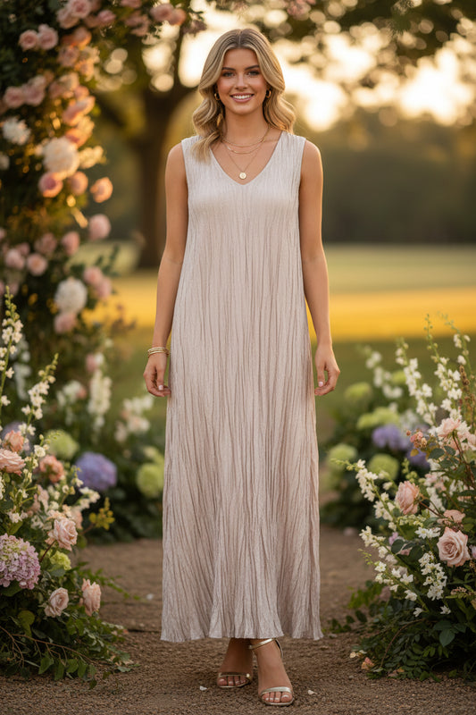 Beige sleeveless dress with a gradient effect on a white background