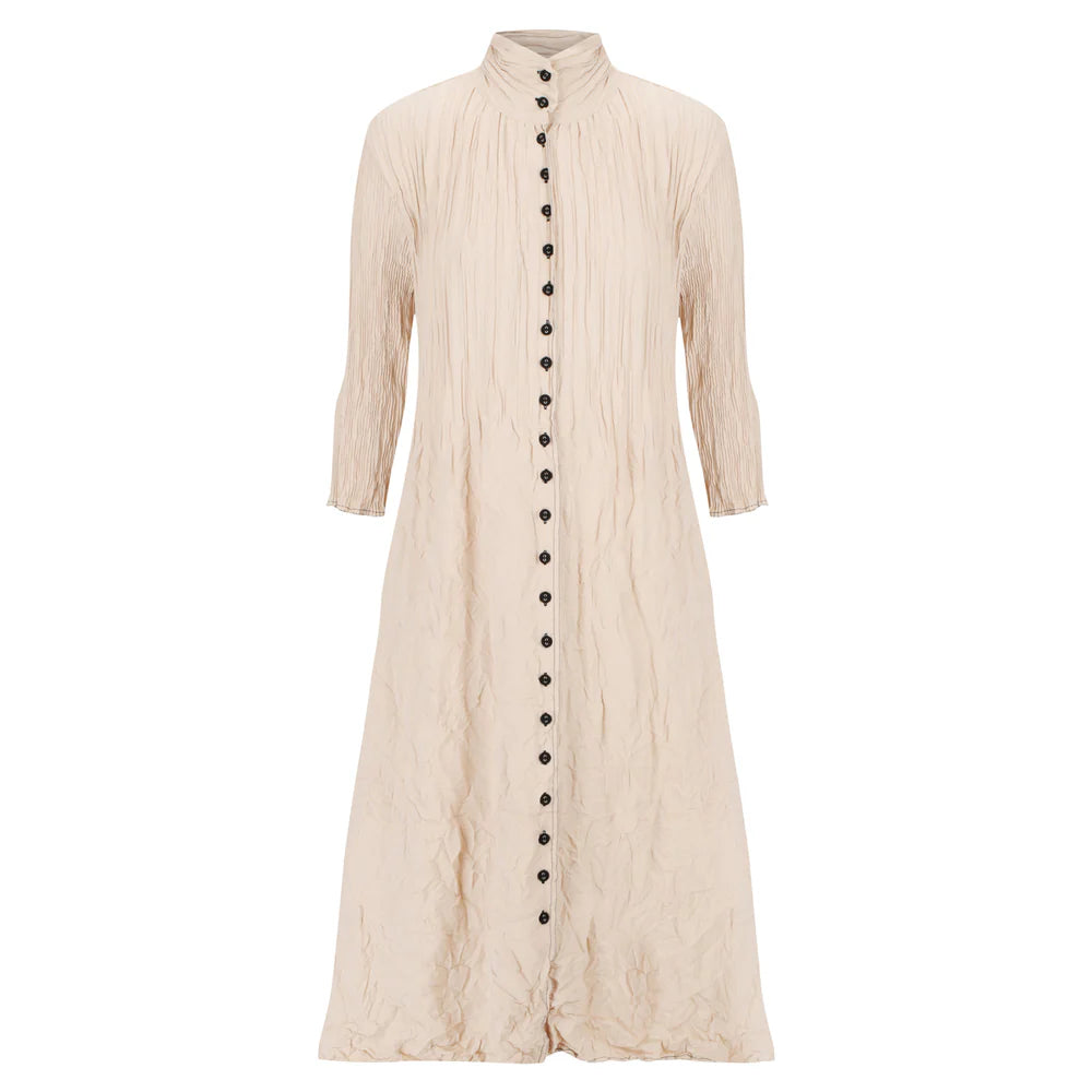 Textured beige long dress with black buttons on a white background