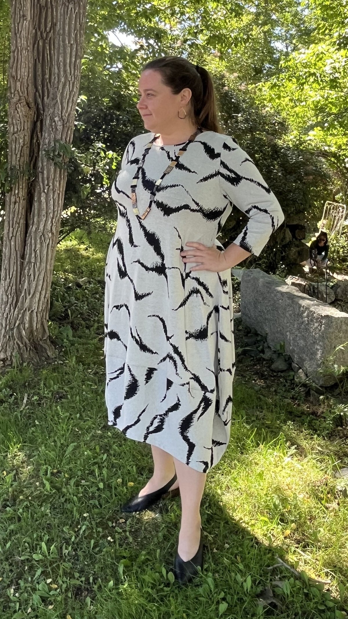 Alma wearing the Kozan Demi dress with an Iskin Sisters long necklace and Pursuits Morph earrings