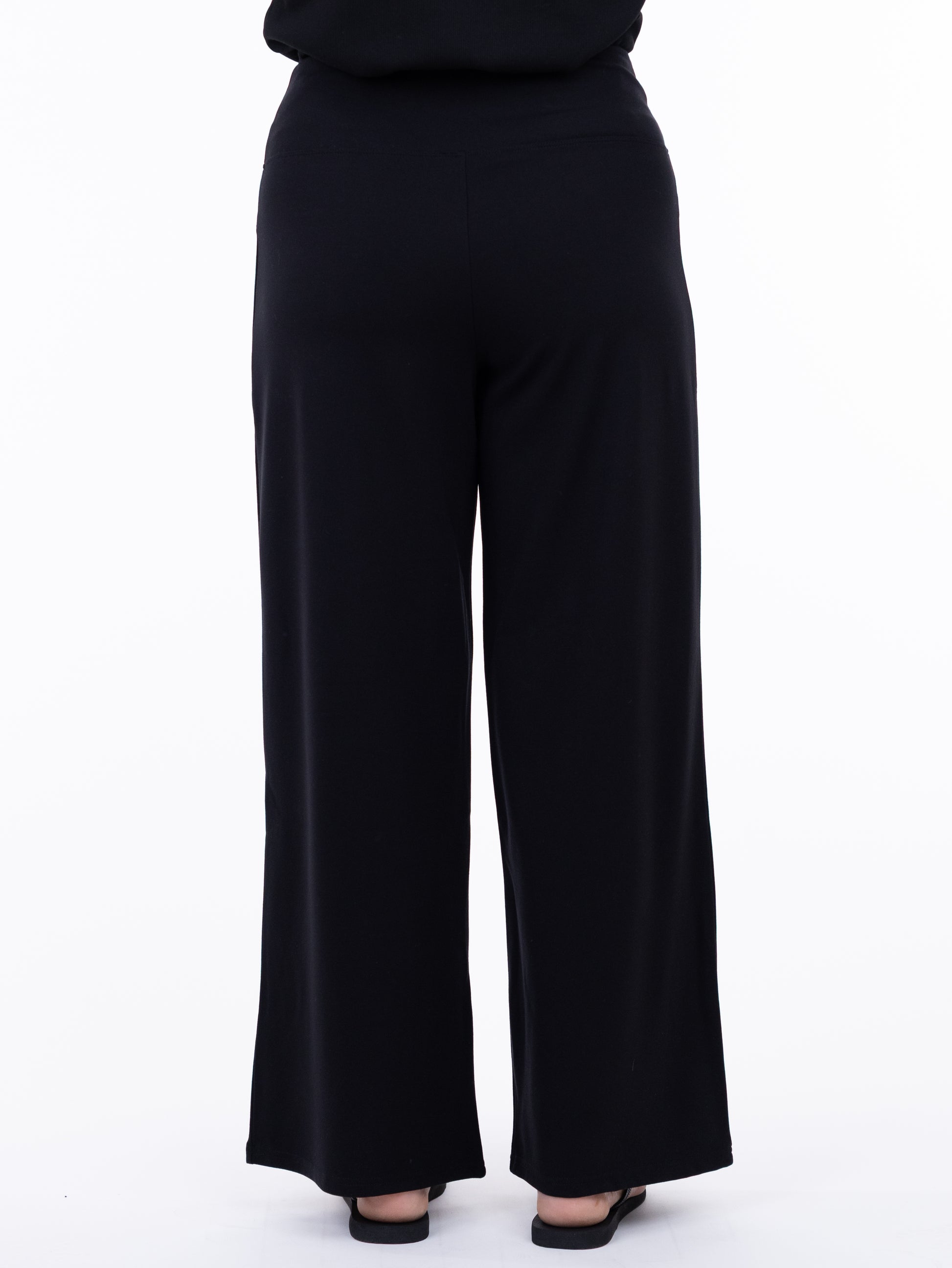 Black wide-leg pants on a white background