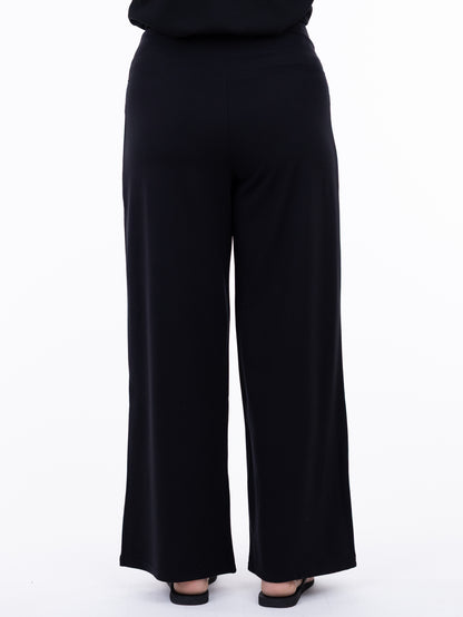 Black wide-leg pants on a white background