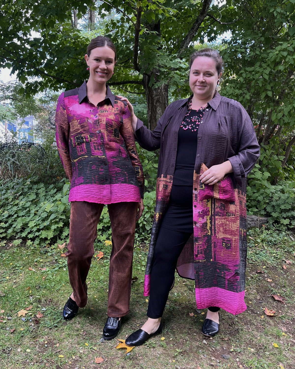 Cari and Alma in NOEN border prints: the blouse with Carreli navy flock jeans and the dress with Blue Sky Kiley pants