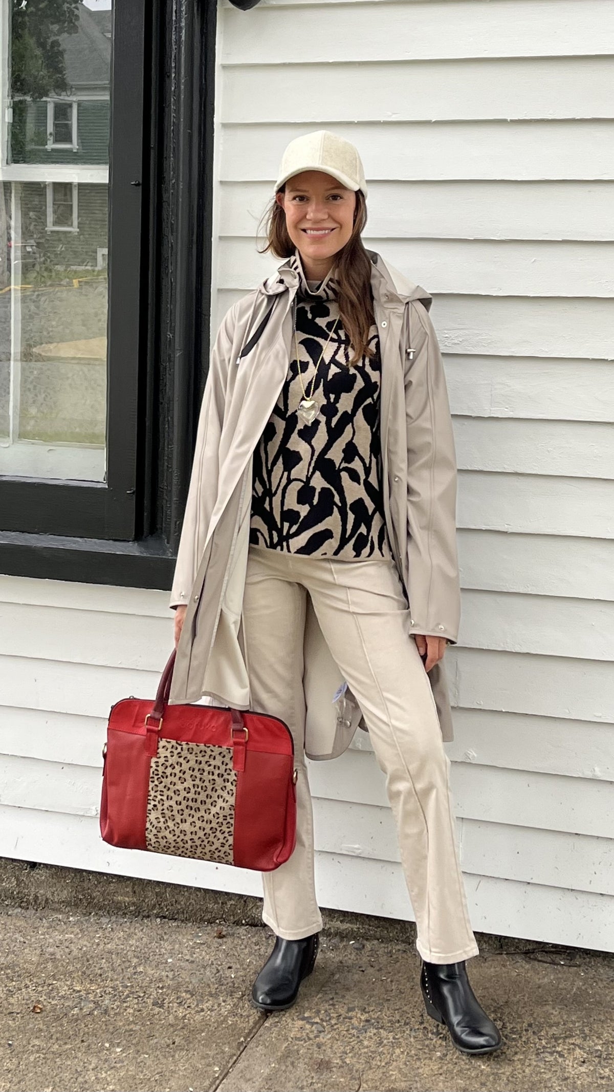 Cari in Lunenburg wearing the Mansted Nanna sweater in mushroom with an Ilse Jacobsen raincoat, Habitat flares and Tom & Eva silk scarf