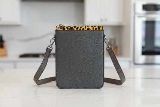 Gray leather crossbody bag with a strap  reverse side