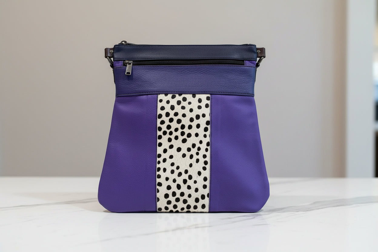 Purple handbag with zip pocket side 3