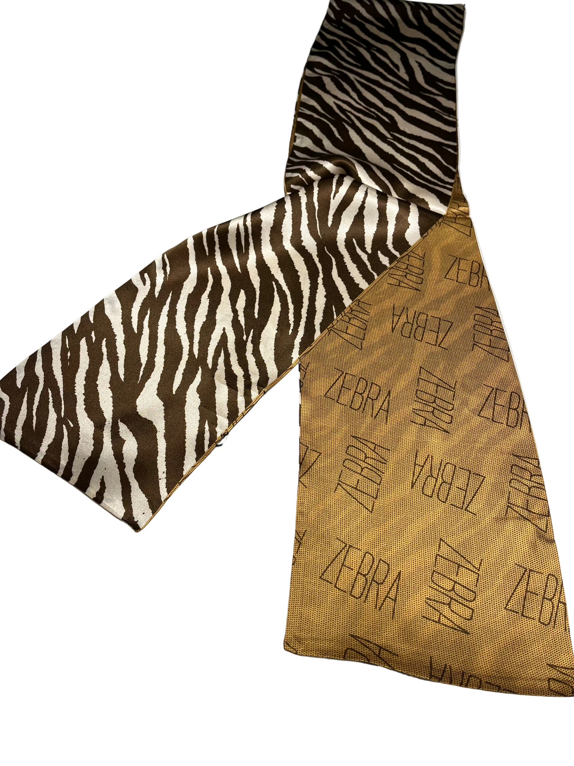 TIGER patterned fabric and brown SCARF with 'Zebra' text 
