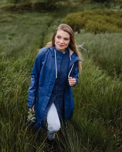 Mernini Long Raincoat in Peony Blue, Suttles & Seawinds, Mahone Bay, Nova Scotia
