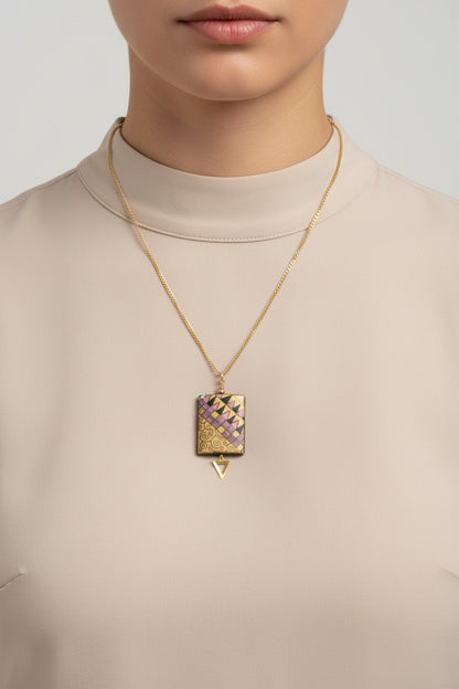 Necklace with geometric pendant on a white background