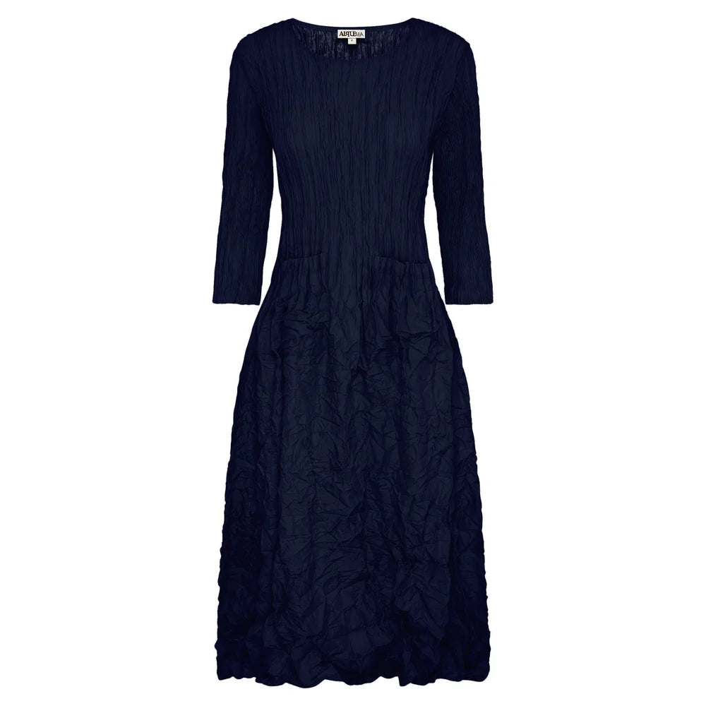 Textured navy blue dress with round neck and 3/4 sleeves on a white background