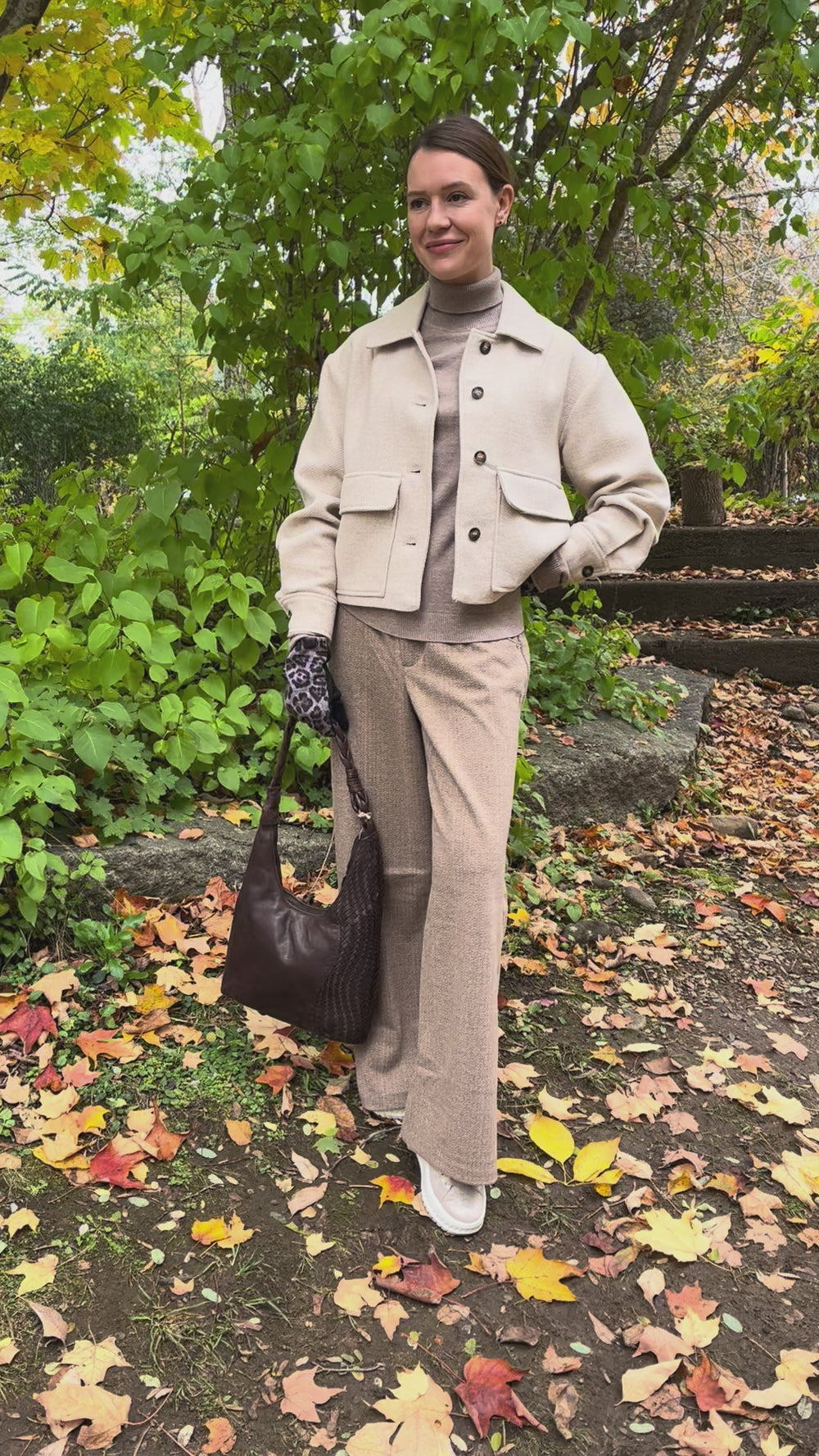 Cari wearing the Ilse Jacobsen short buttoned jacket in wheat, B. Copenhagen turtleneck and Wit & Wisdom Whitney trousers, with the Milo Albany bag and LUV & Co. leopard gloves