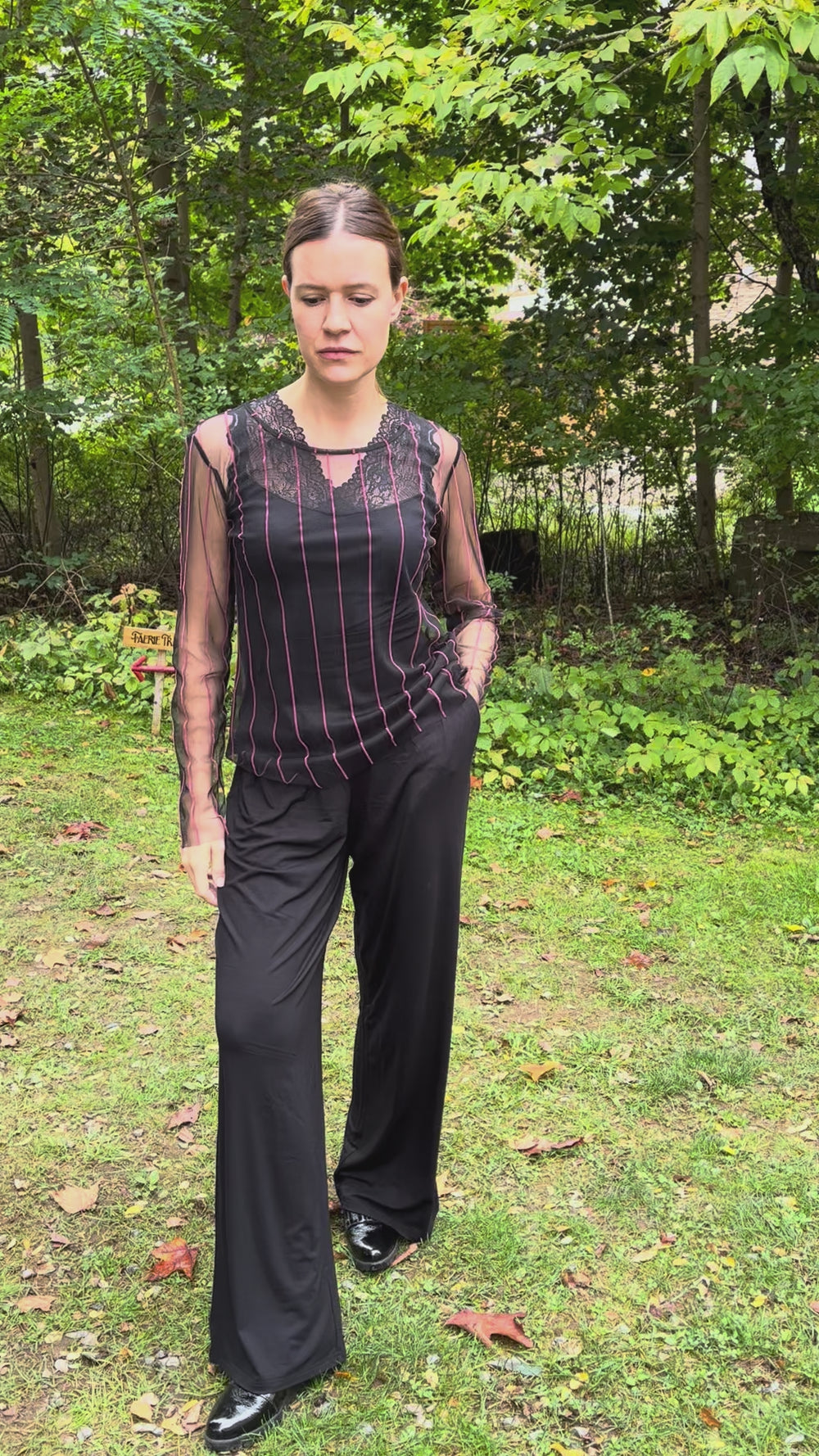 Cari in black for date night: Luukaa flocked stripe mesh top over a Minus Vanessa top with Blue Sky Gaylene pants
