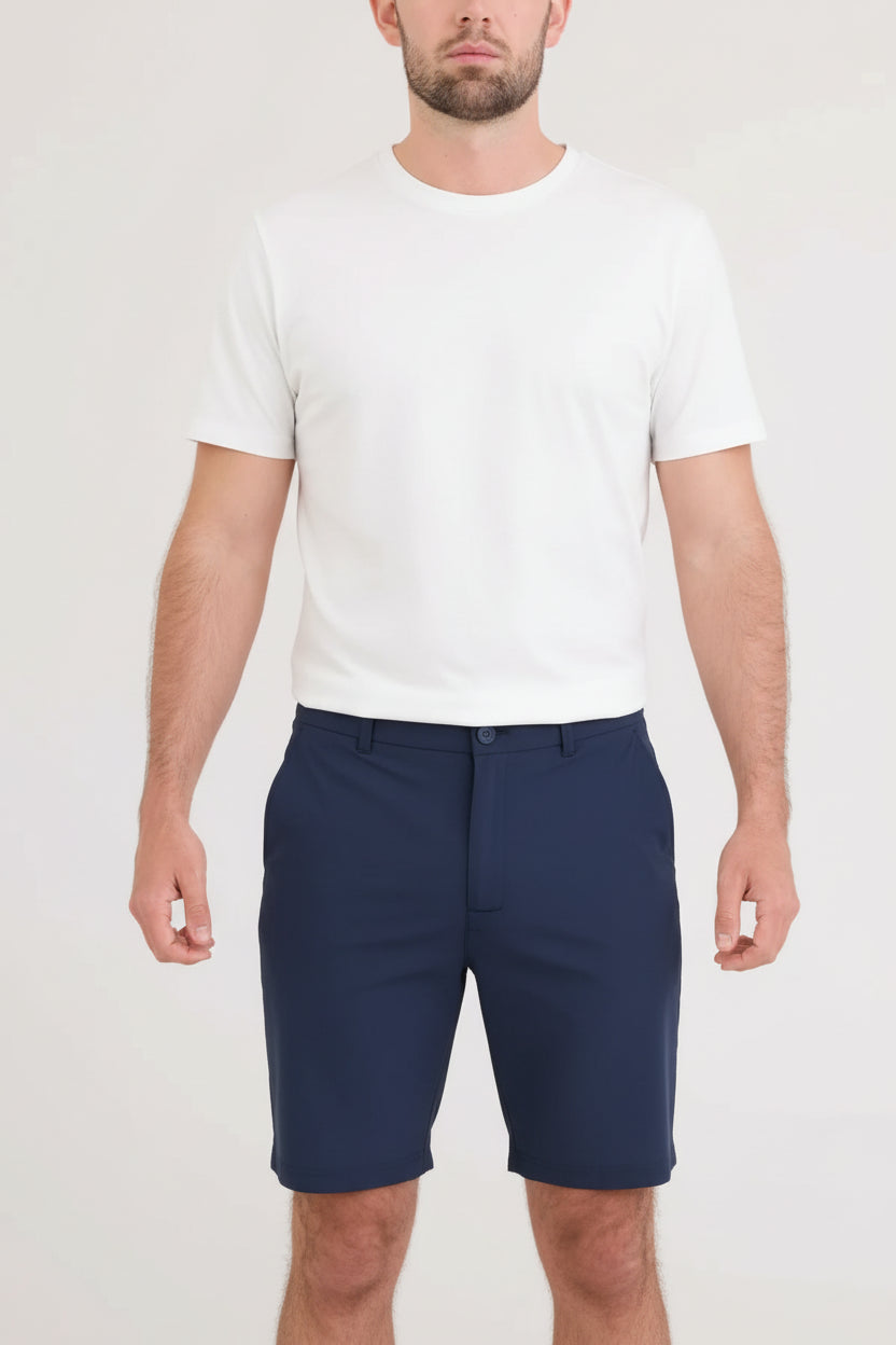 Man wearing NAVY shorts against a plain background