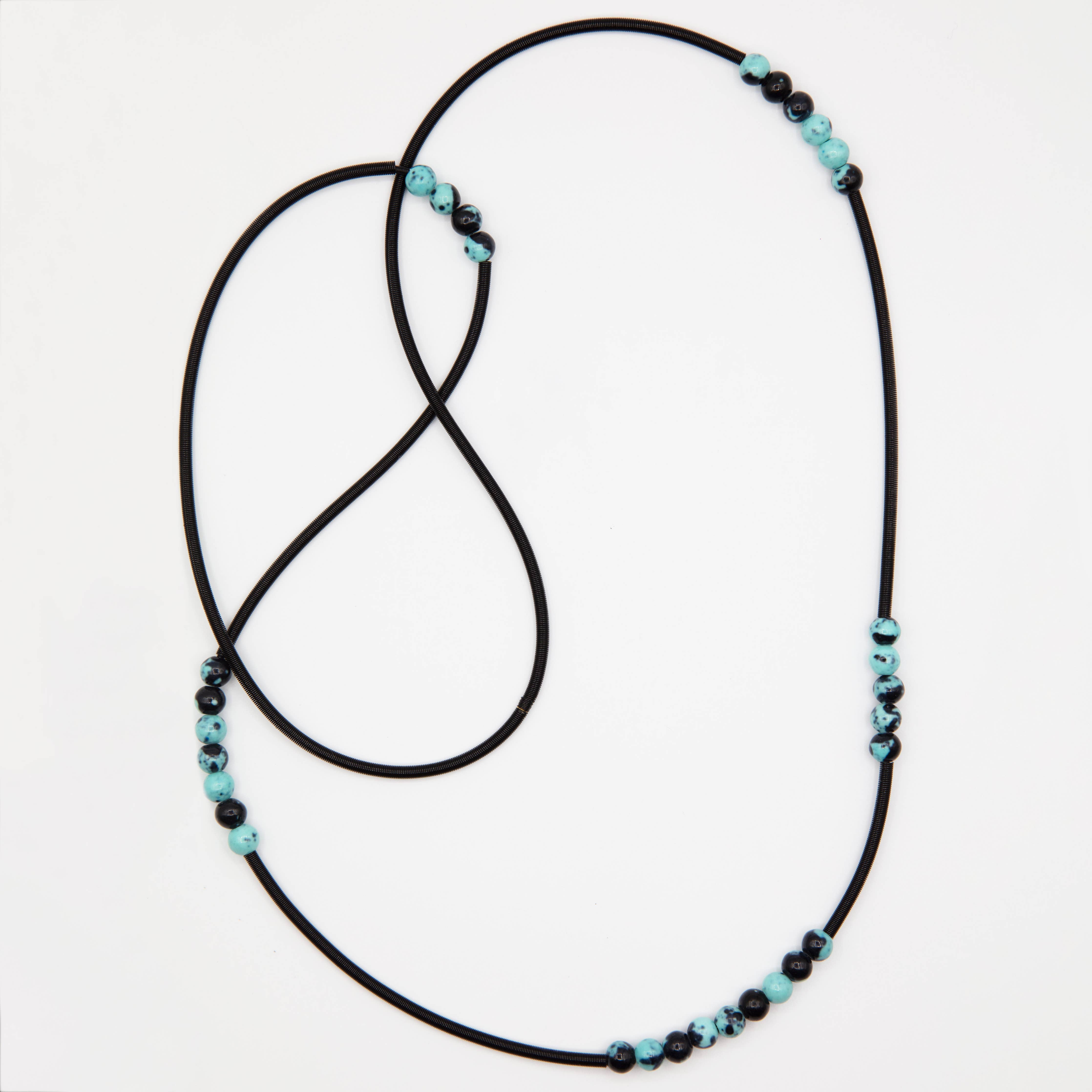 Sea Lily - Long Black Wire Necklace W/Small Blue/Black Imper