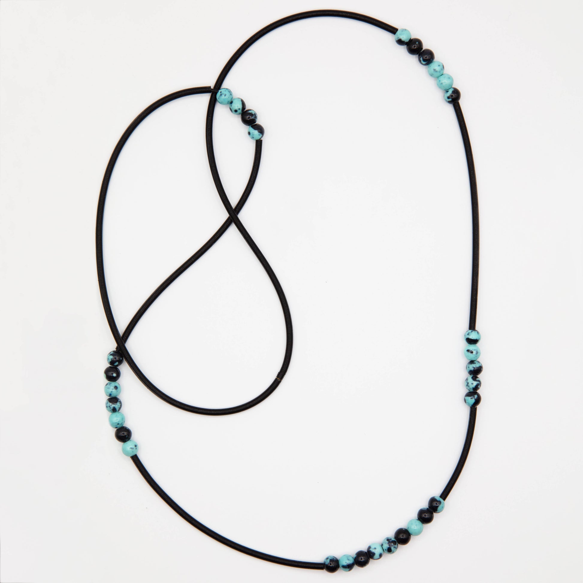 Sea Lily - Long Black Wire Necklace W/Small Blue/Black Imper - Suttles & Seawinds
