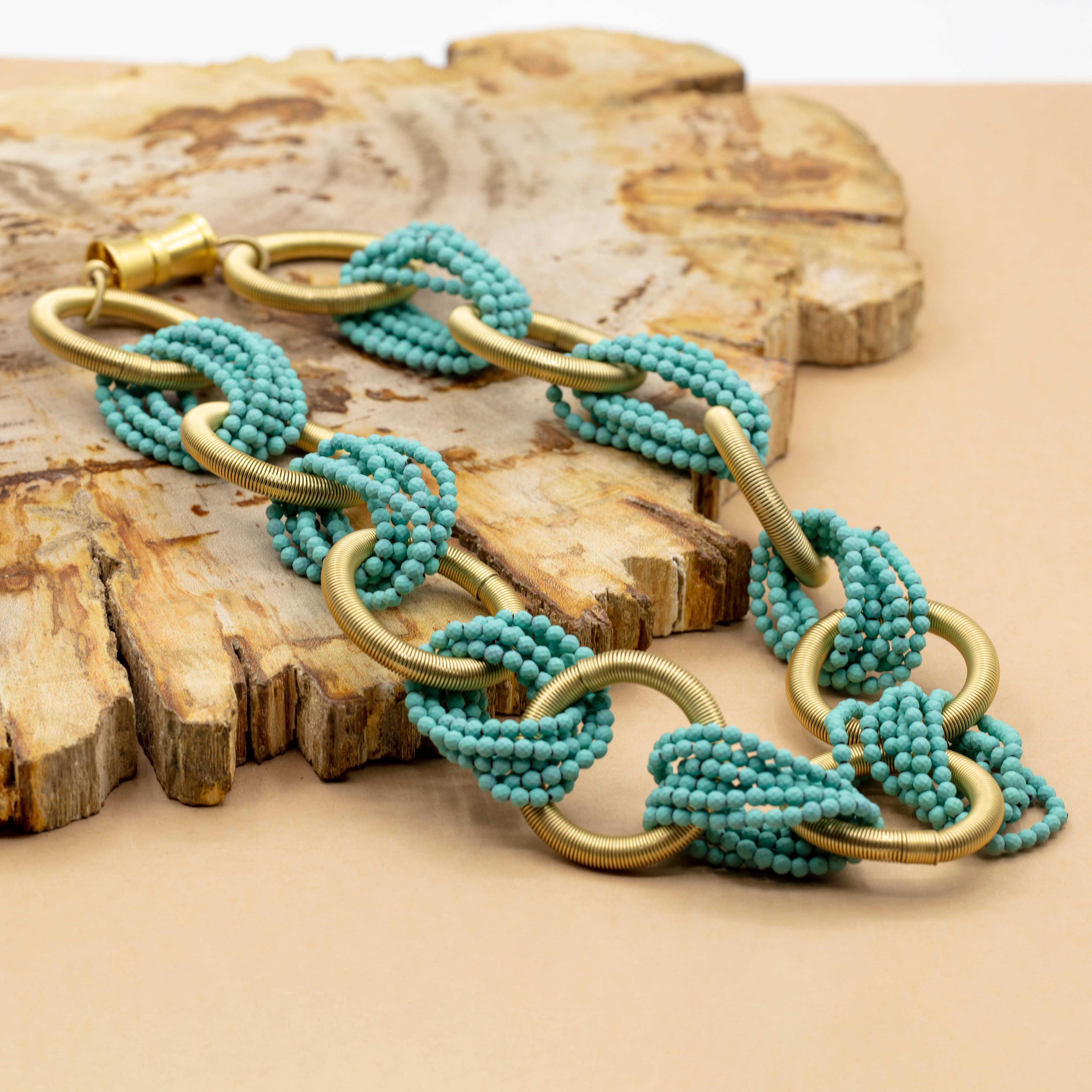 Sea Lily - Gold rings with connecting turquoise hematite beads necklace